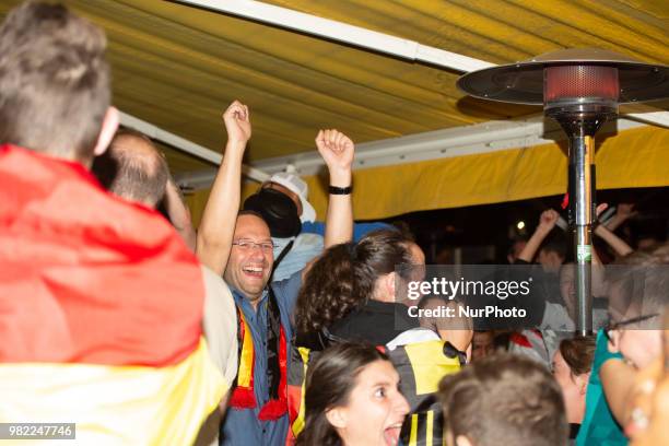 Fans celebrating the goal of Germany in the last second. German fans watched the match Germany Sweden 2-1, which Germany won in the last minute, of...