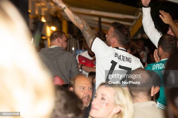 Fans celebrating the goal of Germany in the last second. German fans watched the match Germany Sweden 2-1, which Germany won in the last minute, of...