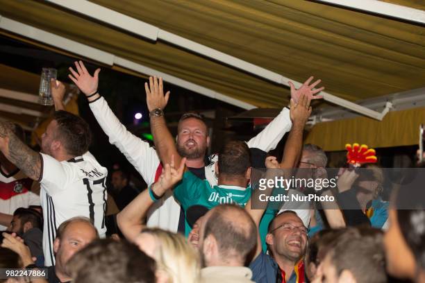 Fans celebrating the goal of Germany in the last second. German fans watched the match Germany Sweden 2-1, which Germany won in the last minute, of...