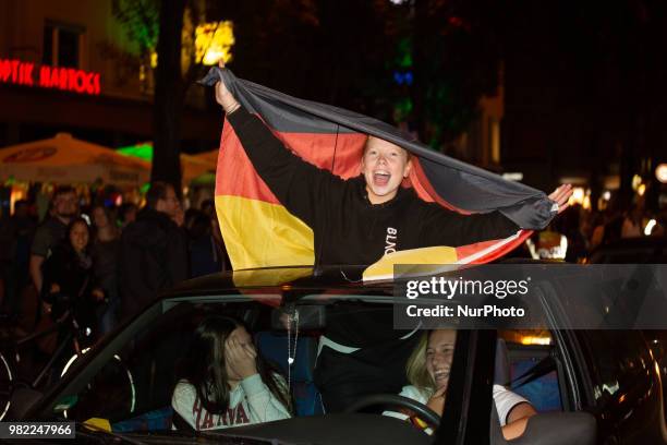 Fans celebrating in the streets of Munich. German fans watched the match Germany Sweden 2-1, which Germany won in the last minute, of the FIFA World...