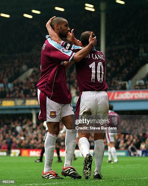 Paolo Di Canio and Frederic Kanoute of West Ham celebrate Joe Cole's goal during the FA Carling Premiership game between West Ham United and Derby...