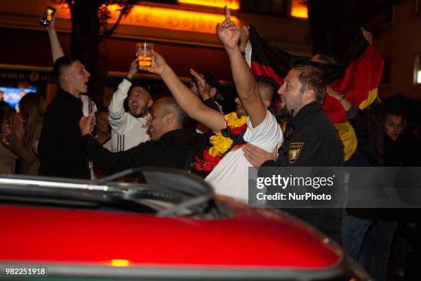 Fans celebrating in the streets of Munich. German fans watched the match Germany Sweden 2-1, which Germany won in the last minute, of the FIFA World...