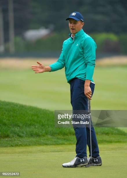 Jordan Spieth reacts to his putt on the seventh hole during the third round of the Travelers Championship at TPC River Highlands on June 23, 2018 in...