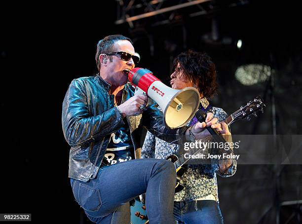 Scott Weiland and Dean DeLeo of Stone Temple Pilots perform during day 1 of the free NCAA 2010 Big Dance Concert Series at White River State Park on...