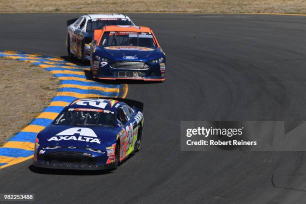 Alex Bowman, driver of the Axalta/Nationwide Chevrolet, leads Ryan Partridge, driver of the Sunrise Ford, during the NASCAR K&N Pro Series West...