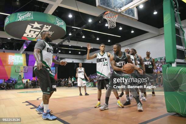 The Game, Kap G, and Tank play basketball at the Celebrity Basketball Game Sponsored By Sprite during the 2018 BET Experience at Los Angeles...