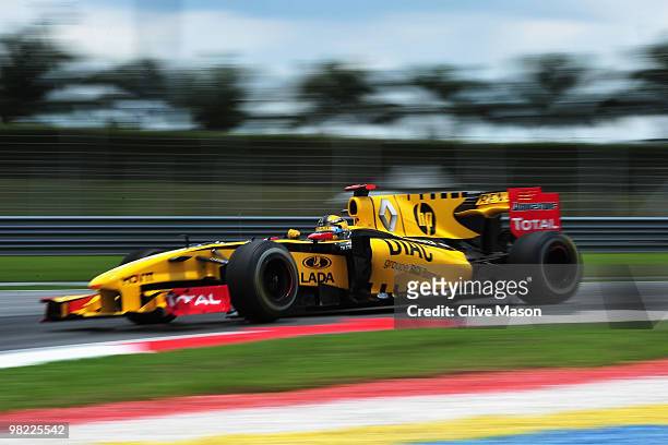 Robert Kubica of Poland and Renault drives during the final practice session prior to qualifying for the Malaysian Formula One Grand Prix at the...