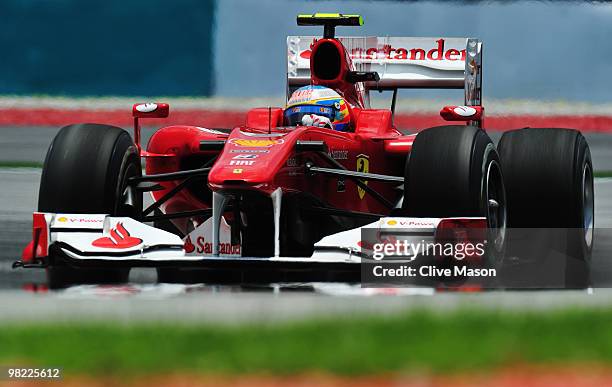 Fernando Alonso of Spain and Ferrari drives during the final practice session prior to qualifying for the Malaysian Formula One Grand Prix at the...