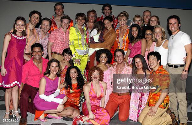 Suri Cruise and Katie Holmes pose with the cast backstage at the hit musical "Mamma Mia!" on Broadway at The Wintergarden Theater on April 2, 2010 in...