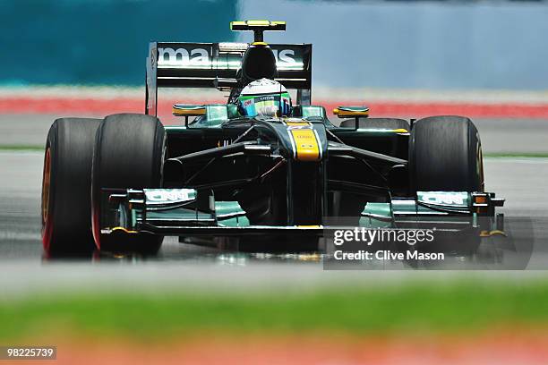 Heikki Kovalainen of Finland and Lotus drives during the final practice session prior to qualifying for the Malaysian Formula One Grand Prix at the...