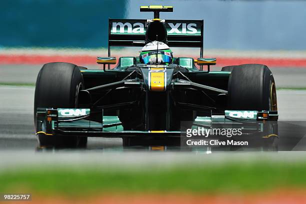 Heikki Kovalainen of Finland and Lotus drives during the final practice session prior to qualifying for the Malaysian Formula One Grand Prix at the...