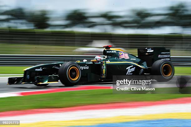 Jarno Trulli of Italy and Lotus drives during the final practice session prior to qualifying for the Malaysian Formula One Grand Prix at the Sepang...