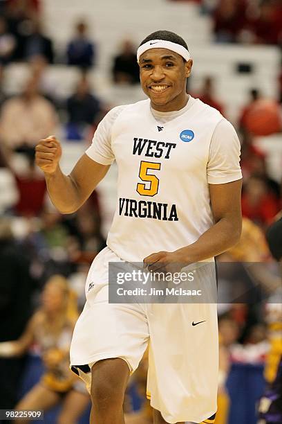 Kevin Jones of the West Virginia Mountaineers reacts against the Washington Huskies during the east regional semifinal of the 2010 NCAA men's...