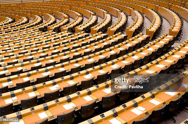 empty assembly room seat of european parliament brussels - european parliament stock pictures, royalty-free photos & images