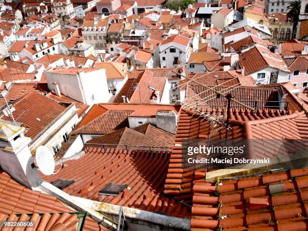 red roofs - television aerial stock pictures, royalty-free photos & images