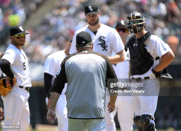 Pitching coach Don Cooper of the Chicago White Sox walks toward the pitchers mound to talk to Lucas Giolito during the game against the Detroit...