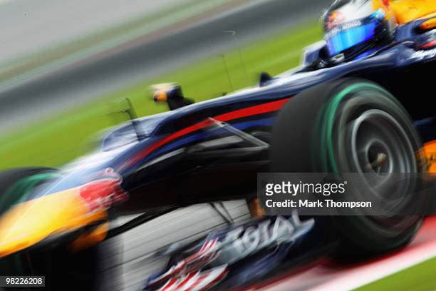 Sebastian Vettel of Germany and Red Bull Racing drives during the final practice session prior to qualifying for the Malaysian Formula One Grand Prix...