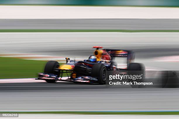 Sebastian Vettel of Germany and Red Bull Racing drives during the final practice session prior to qualifying for the Malaysian Formula One Grand Prix...