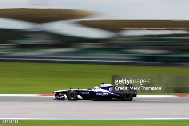 Rubens Barrichello of Brazil and Williams drives during the final practice session prior to qualifying for the Malaysian Formula One Grand Prix at...