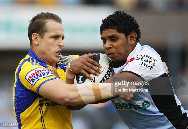 Albert Kelly of the Sharks is tackled by Jeff Robson of the Eels during the round four NRL match between the Cronulla Sharks and the Parramatta Eels...