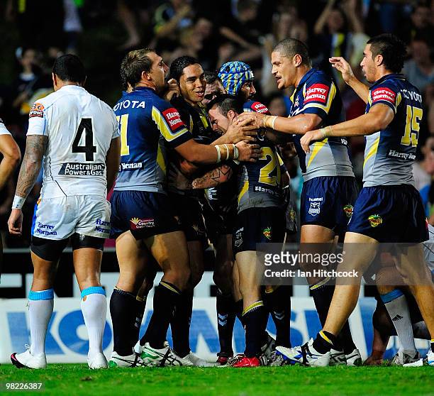 The Cowboys celebrate the try of Willie Tonga of the Cowboys during the round four NRL match between the North Queensland Cowboys and the Gold Coast...