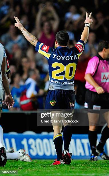 Shannon Gallant of the Cowboys celebrates the try of Willie Tonga during the round four NRL match between the North Queensland Cowboys and the Gold...