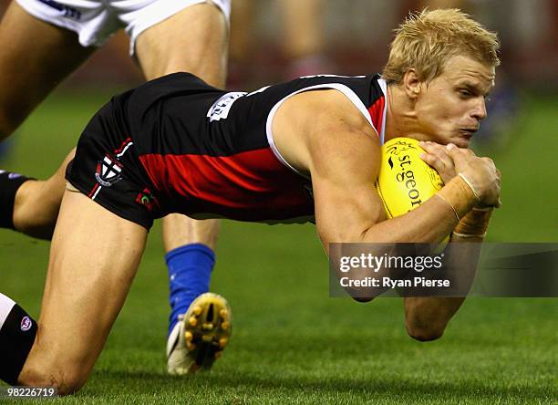 Nick Riewoldt of the Saints marks during the round two AFL match between the St Kilda Saints and the North Melbourne Kangaroos at Etihad Stadium on...