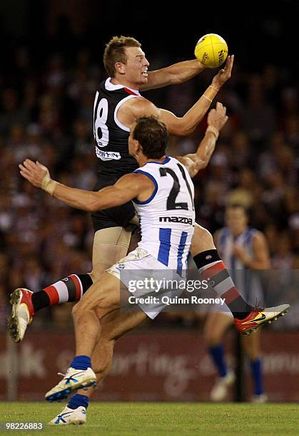 Brendon Goddard of the Saints handballs during the round two AFL match between the St Kilda Saints and the North Melbourne Kangaroos at Etihad...