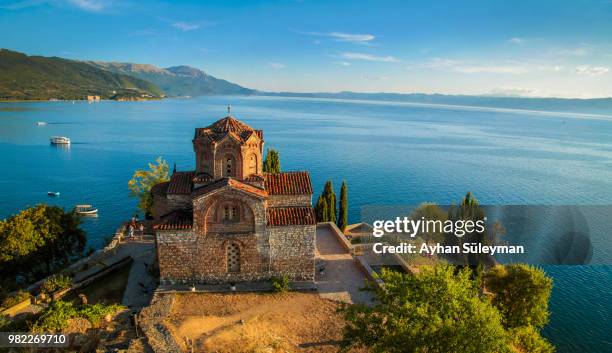 a church on a hill above the sea in ohird, macedonia - ohrid bildbanksfoton och bilder