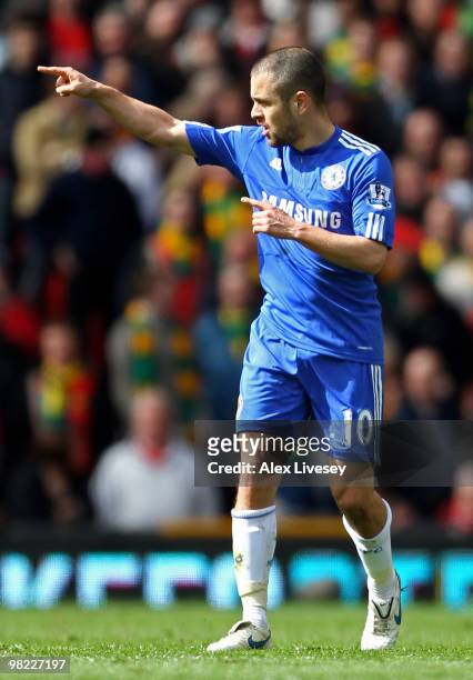 Joe Cole of Chelsea celebrates scoring the opening goal during the Barclays Premier League match between Manchester United and Chelsea at Old...
