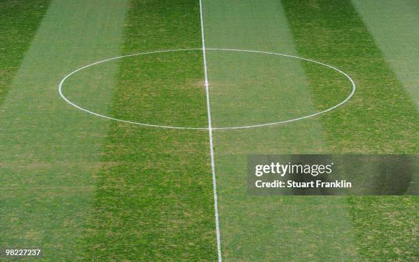 View of the damaged pitch and worn grass at the Veltins Arena before the start of the Bundesliga match between FC Schalke 04 and FC Bayern Muenchen...