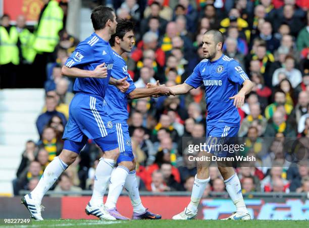 Joe Cole of Chelsea is congratulated by team mate Paulo Ferreira after scoring the opening goal during the Barclays Premier League match between...