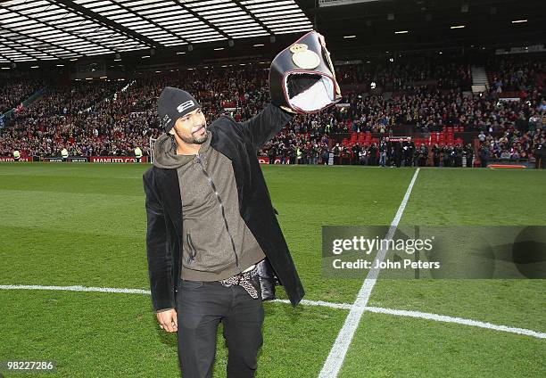 Heavyweight boxing Champion of the World David Haye poses with his belt ahead of the FA Barclays Premier League match between Manchester United and...