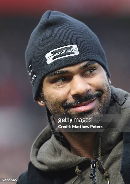 Heavyweight boxing Champion of the World David Haye is presented to the crowd ahead of the FA Barclays Premier League match between Manchester United...
