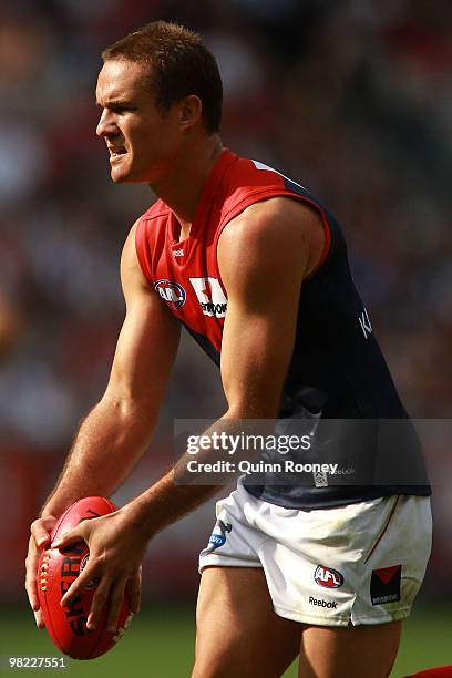 Brad Green of the Demons kicks during the round two AFL match between the Collingwood Magpies and the Melbourne Demons at the Melbourne Cricket...