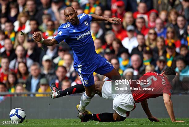 Nicolas Anelka of Chelsea is tackled by Rio Ferdinand of Manchester United during the Barclays Premier League match between Manchester United and...