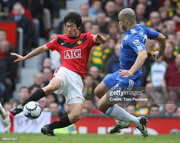 Ji-Sung Park of Manchester United clashes with Alex of Chelsea during the FA Barclays Premier League match between Manchester United and Chelsea at...
