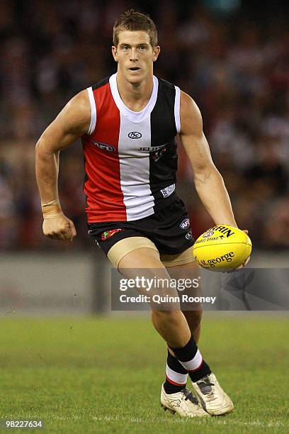 Nick Dal Santo of the Saints handballs during the round two AFL match between the St Kilda Saints and the North Melbourne Kangaroos at Etihad Stadium...