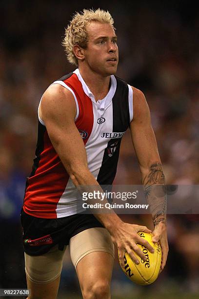 Jason Gram of the Saints kicks during the round two AFL match between the St Kilda Saints and the North Melbourne Kangaroos at Etihad Stadium on...