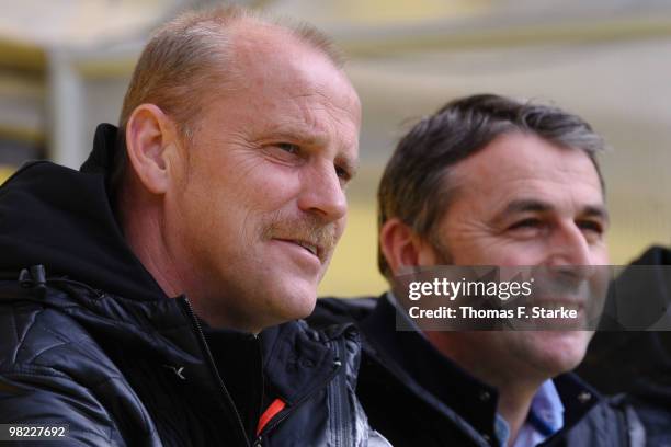 Manager Klaus Allofs of Bremen and to head coach Thomas Schaaf look on prior to the Bundesliga match between Borussia Dortmund and SV Werder Bremen...