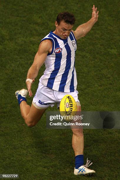 Brent Harvey of the Kangaroos kicks during the round two AFL match between the St Kilda Saints and the North Melbourne Kangaroos at Etihad Stadium on...