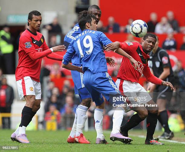 Patrice Evra of Manchester United clashes with Paolo Ferreira of Chelsea during the FA Barclays Premier League match between Manchester United and...