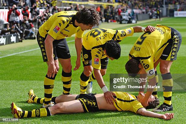 Mats Hummels, Lucas Barrios and Sebastian Kehl of Dortmund celebrate with Neven Subotic during the Bundesliga match between Borussia Dortmund and SV...