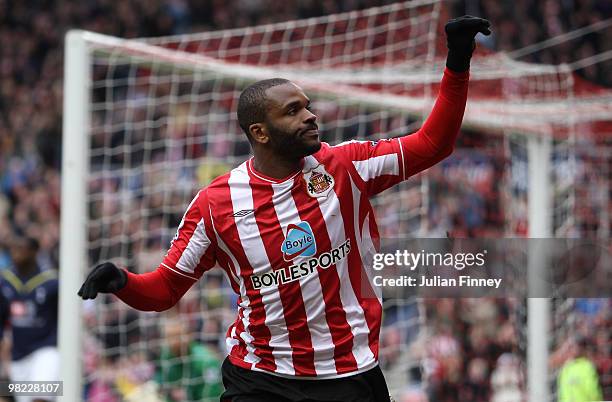 Darren Bent of Sunderland celebrates scoring a goal during the Barclays Premier League match between Sunderland and Tottenham Hotspur at Stadium of...