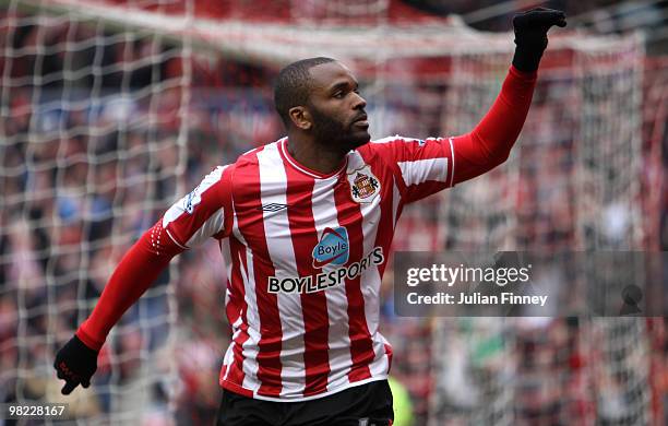 Darren Bent of Sunderland celebrates scoring a goal during the Barclays Premier League match between Sunderland and Tottenham Hotspur at Stadium of...