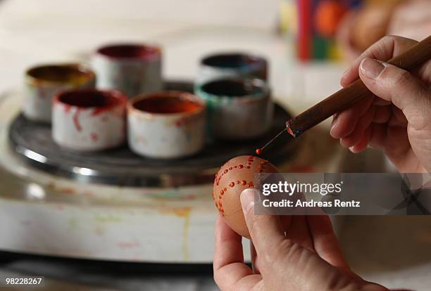 Ute Henschel paints an easter egg in traditional Sorbian motives on the season opening of the open-air museum Lehde on April 3, 2010 in Lehde, near...