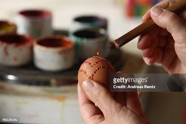 Ute Henschel paints an easter egg in traditional Sorbian motives on the season opening of the open-air museum Lehde on April 3, 2010 in Lehde, near...