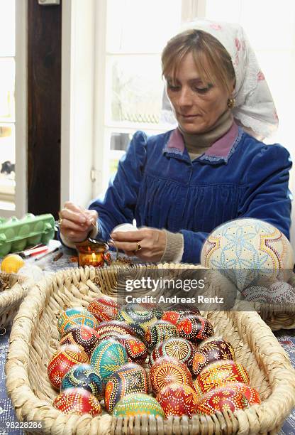 Ute Henschel paints an easter egg in traditional Sorbian motives on the season opening of the open-air museum Lehde on April 3, 2010 in Lehde, near...