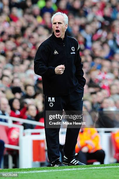 Manager of Wolverhampton Wanderers, Mick McCarthy shouts to his team during the Barclays Premier League match between Arsenal and Wolverhampton...