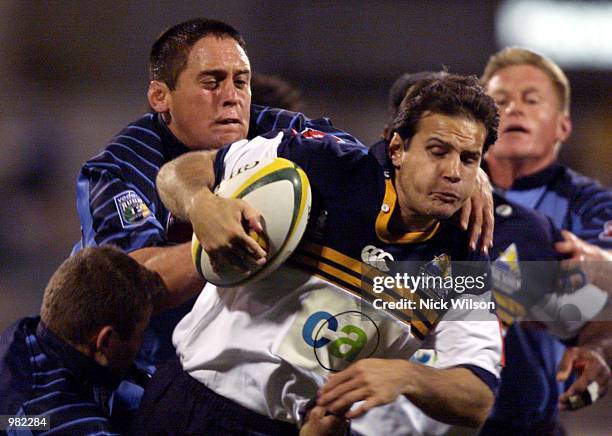 Mark Bartholomeusz of the ACT Brumbies takes the ball forward during the Super 12 Match between the ACT Brumbies and the Nothern Bulls played at...